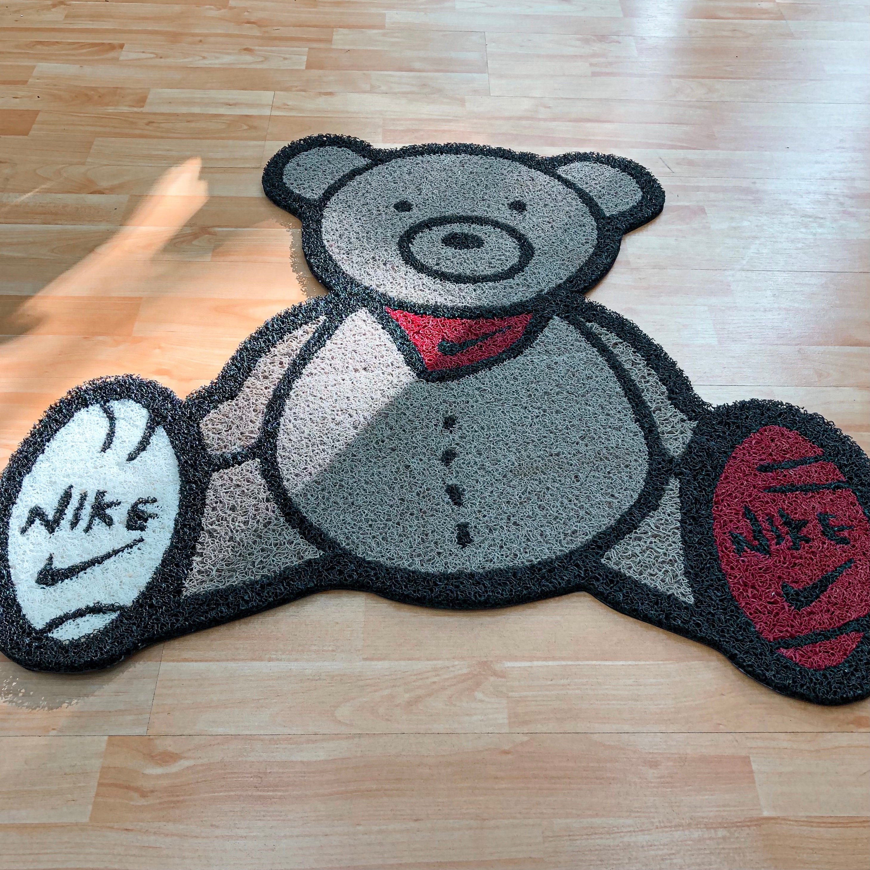 Tapete oso Nike
